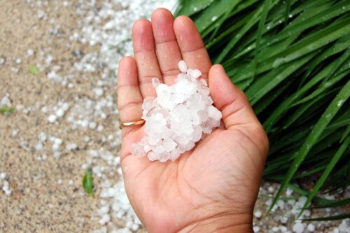 Which materials are recommended for areas prone to hail?